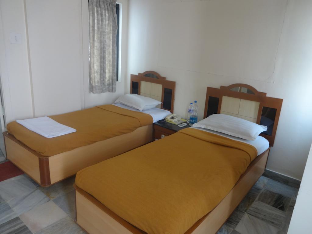 קוימבטור Hotel Vinayak חדר תמונה